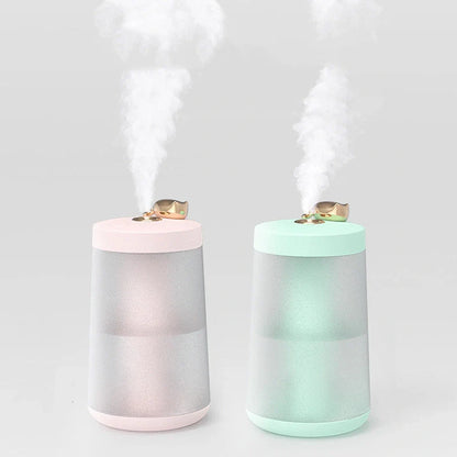 Columnar cat humidifier with electroplated finish and USB cable connection