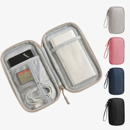 Light grey portable buggy bag for cable storage measuring 19x11x3cm with handbag-type shape