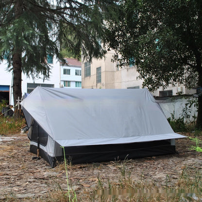 Brown and white portable A-line camping tent set up with hiking poles, showing its spacious interior for 2-3 people.