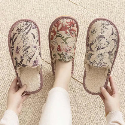 Pair of floral cotton slippers with linen-texture upper and light PVC sole for home wear.