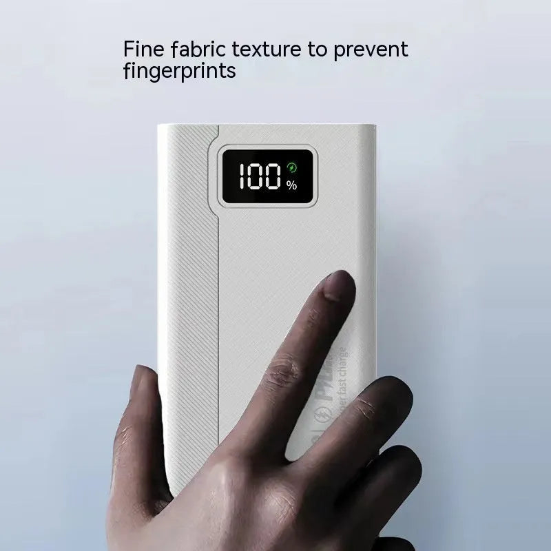Black or white large capacity power bank showing its portable size and charging port.