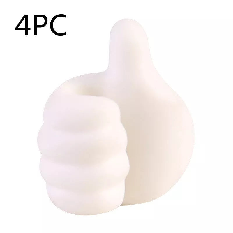 Silicone thumb wall hooks in various colors for organizing kitchen and bathroom items