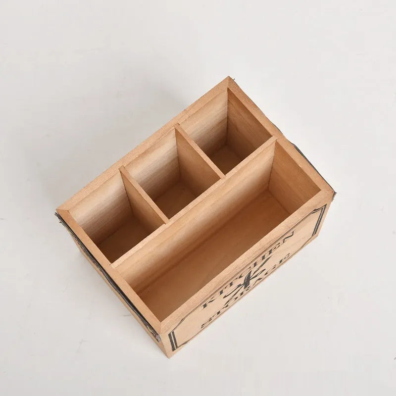 Solid wood kitchen storage box with internal grid divider for organising cutlery and chopsticks.