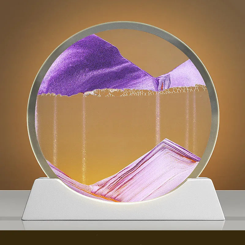 A rotary abstract night lamp with coloured sand falling inside clear glass, showing blue variant.