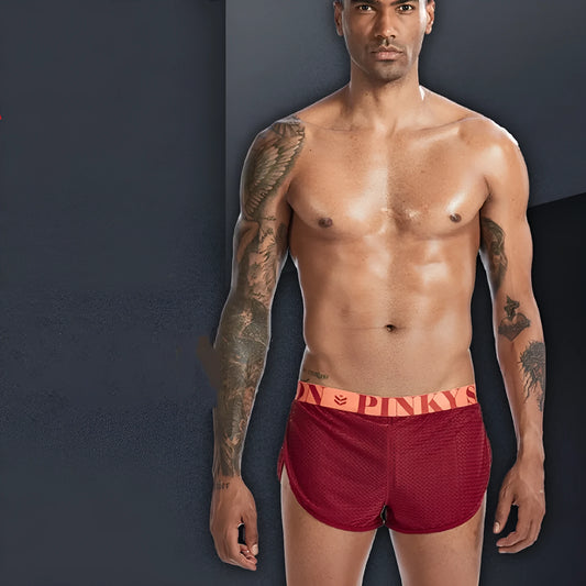 Breathable mesh men's boxer briefs in black, shown laid flat