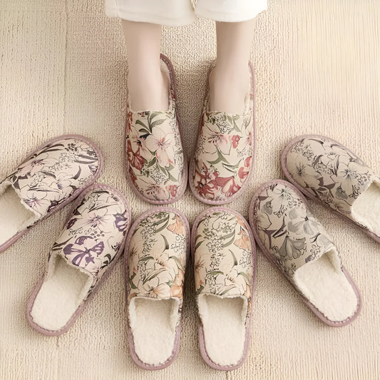 Pair of floral cotton slippers with linen-texture upper and light PVC sole for home wear.