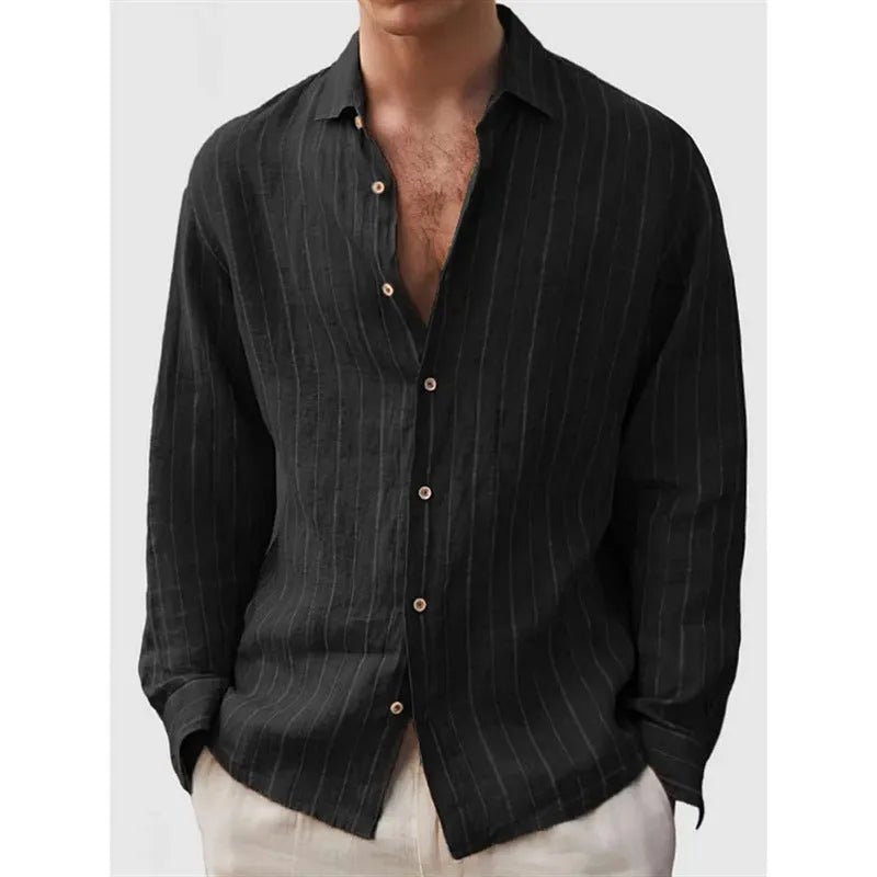 Man wearing a loose striped cardigan-style shirt with short sleeves.