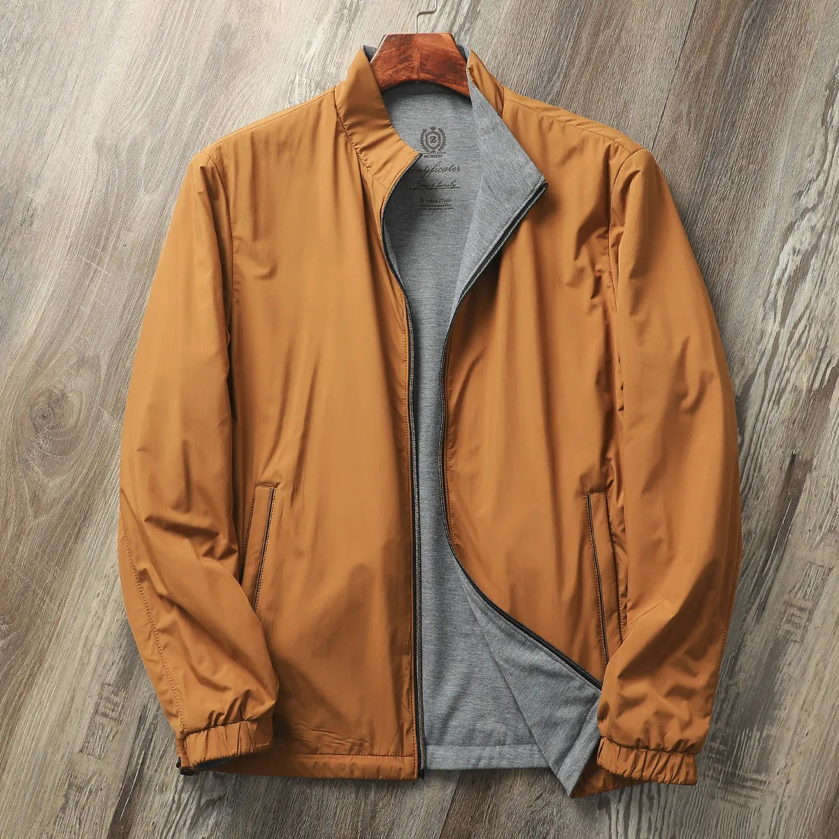 Men's simple stand collar casual jacket in army green, shown on a model.