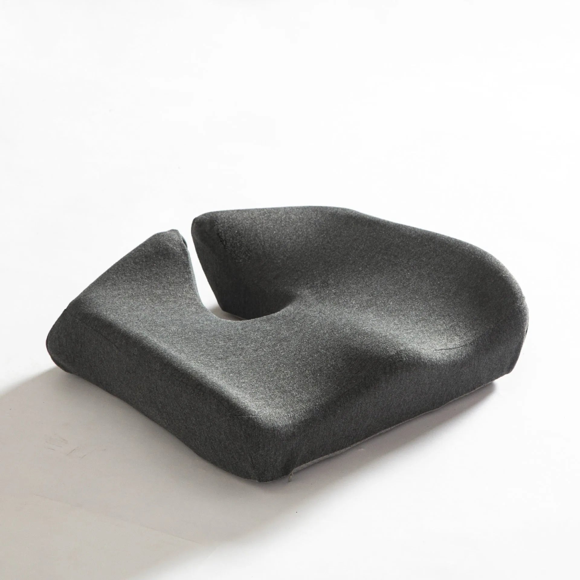 Memory foam office chair cushion with contoured waist support measuring 36x40x11cm in dark grey
