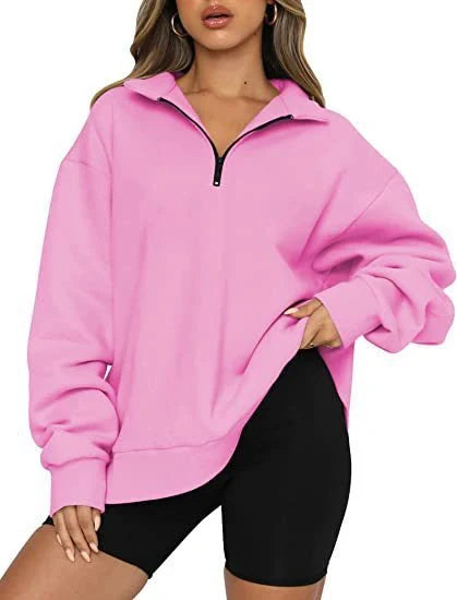 Women's zip turndown collar sweatshirt in various colors, showcasing loose fit and zipper detail.