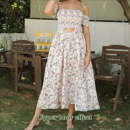 Women's off shoulder strapless floral dress in a lightweight fabric, available in multiple sizes.