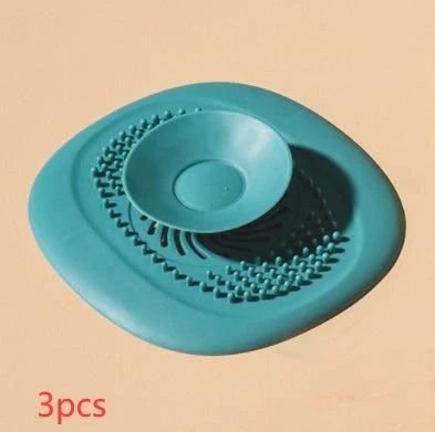 TPR vortex design sink drain cover in twilight orange, quiet blue, mango yellow, and gentian green