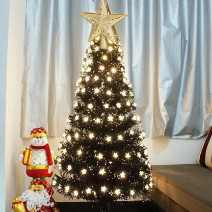 3D Glitter Silver Snow Christmas Tree Topper with LED Snowflake Projector illuminating a room with festive patterns
