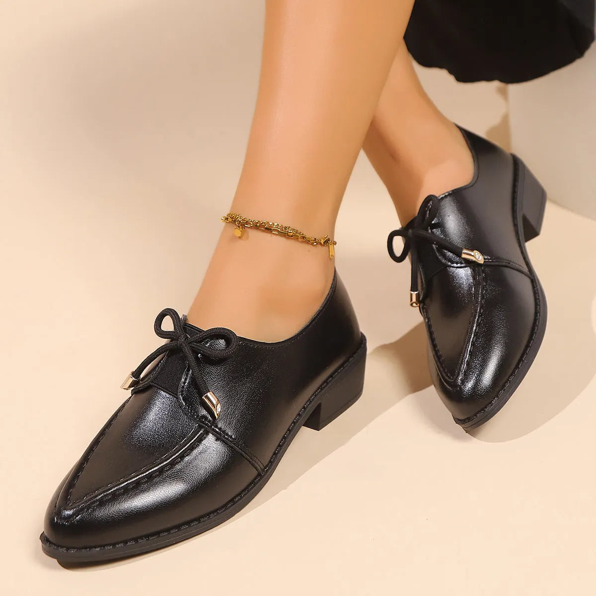 Women's British-style shoes with bow decoration, PU upper, and rubber sole in available sizes 36-43