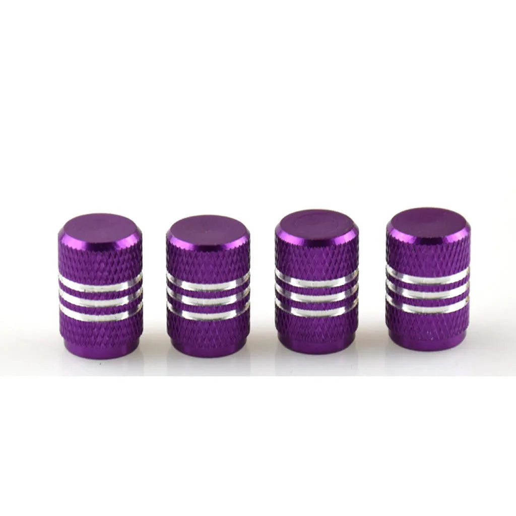 Set of stainless steel car tyre valve caps in multiple colours: black, red, blue, gold, silver, green, purple, sky blue, grey, orange.