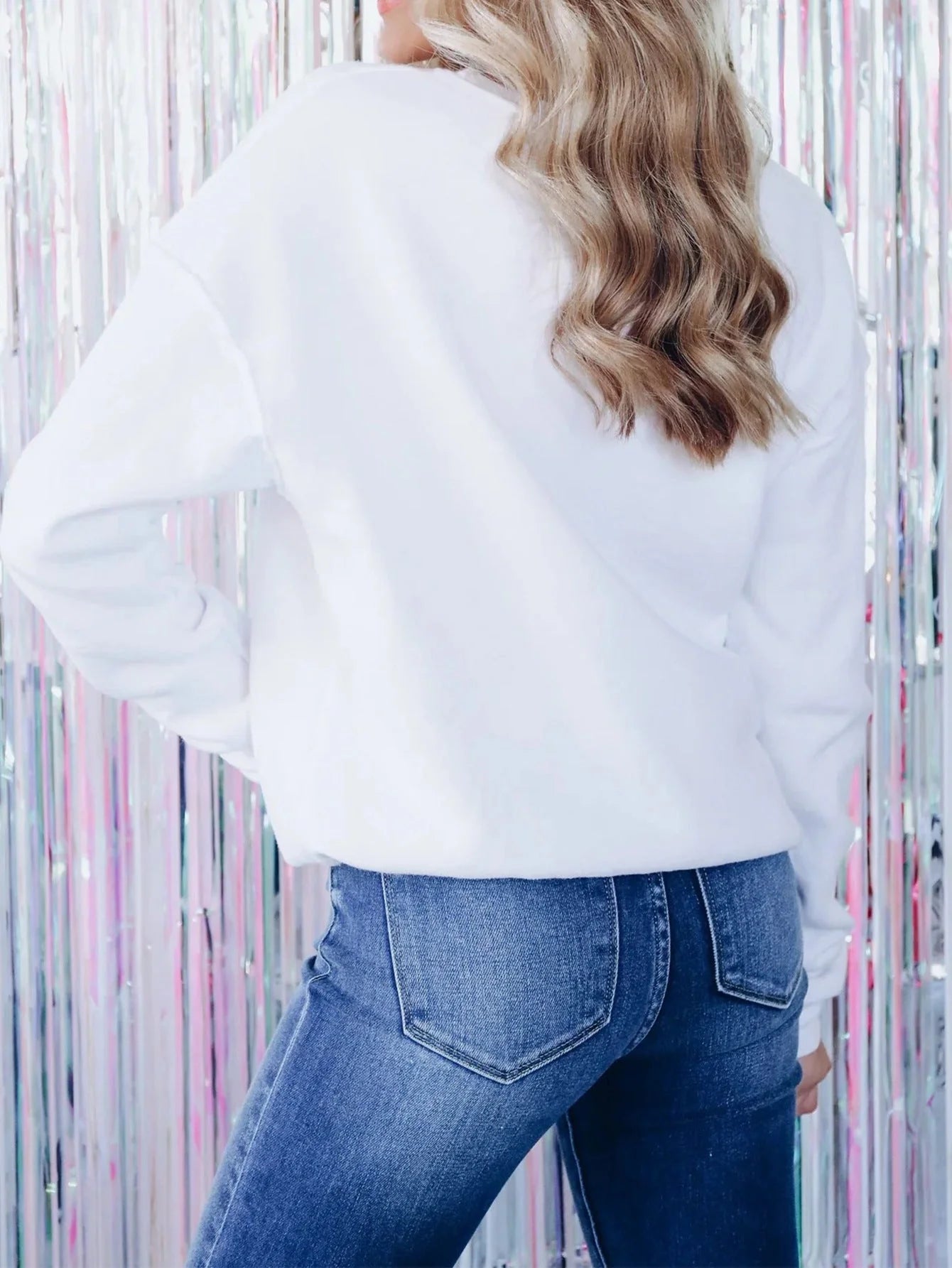 Women's Christmas Tree Sequin Sweatshirt in milky white with sparkling embroidery, perfect for holiday fashion.