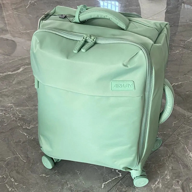 Ultra-light waterproof Oxford cloth suitcase in bluestone green with universal wheels and breathable lining
