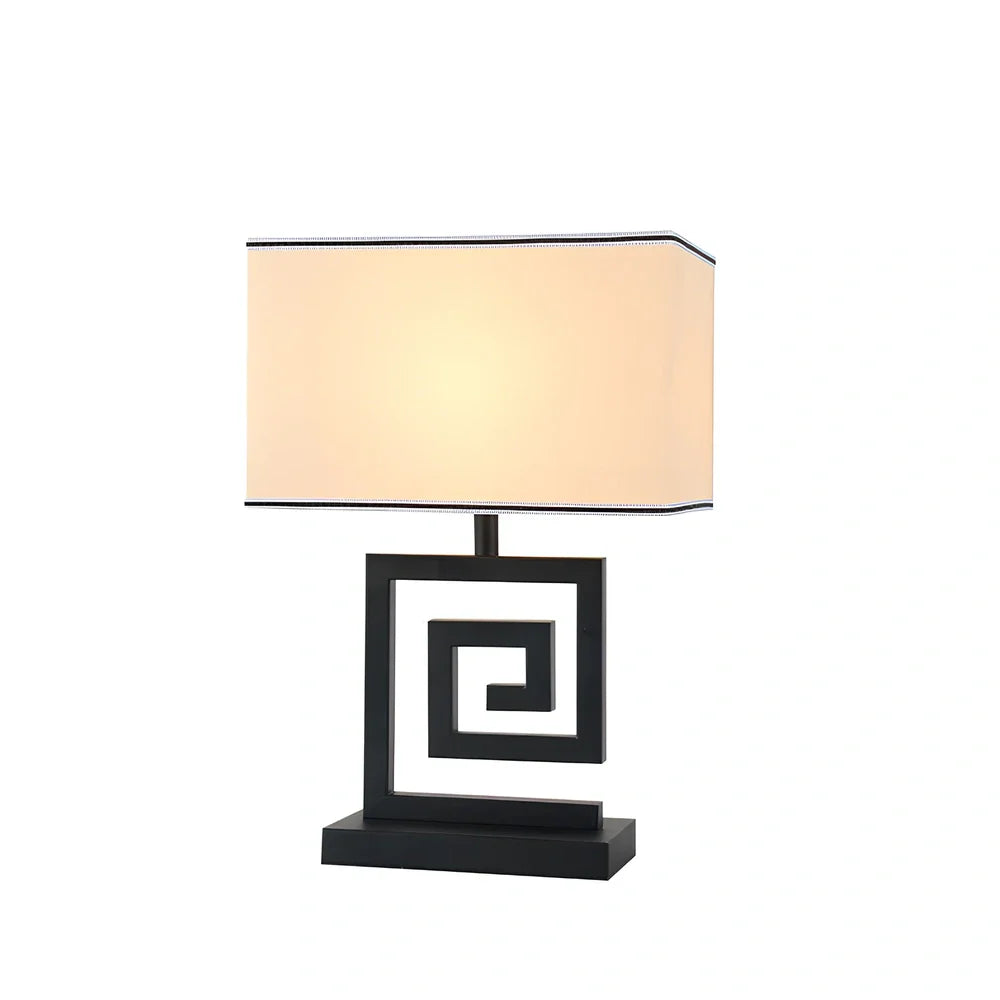 Retro style table lamp with fabric shade and iron base, remote control operation