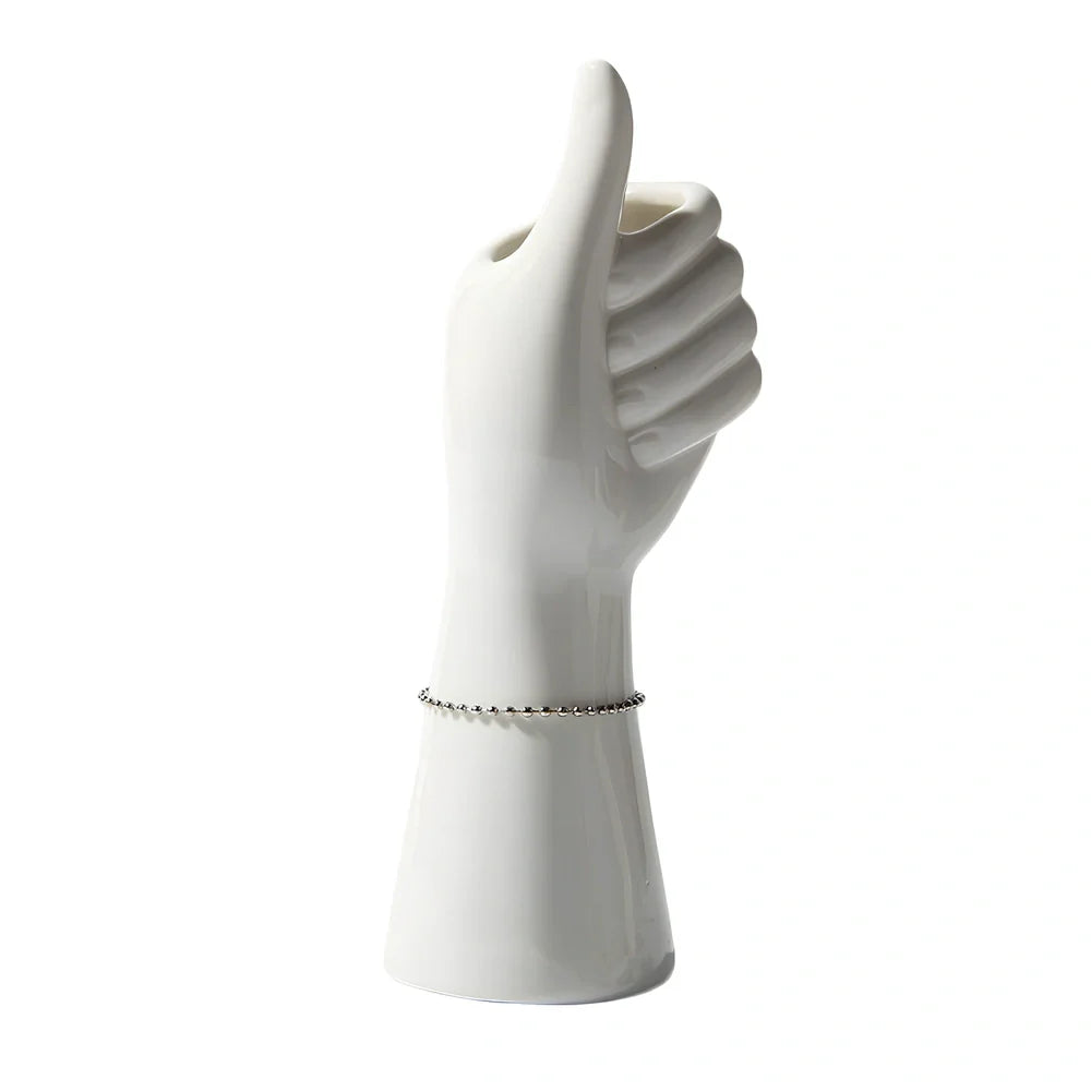 Ceramic human body vase with colour glaze finish showing decorative figures patterns, displayed as hanging ornament