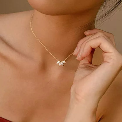 Minimalist lotus flower petal necklace in gold or silver, perfect for women and girls.