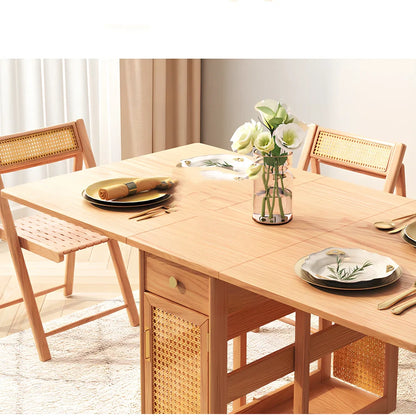 Natural rattan folding dining table extended to 145cm length with wood frame