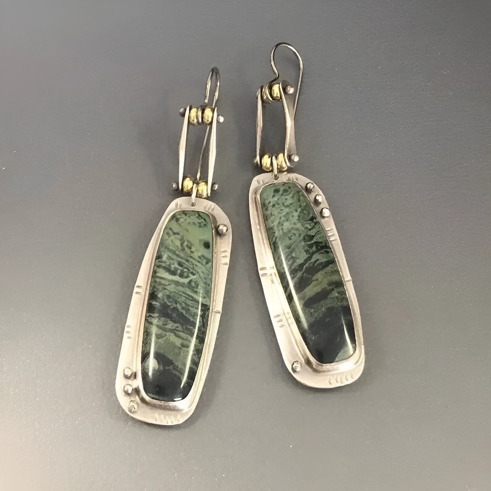 Two-tone geometric alloy earrings with marble pattern, lightweight design for all-day wear