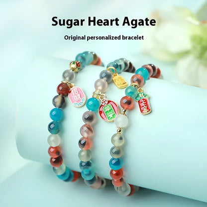 Women's natural agate bracelet with copper coin snake elements in geometric design
