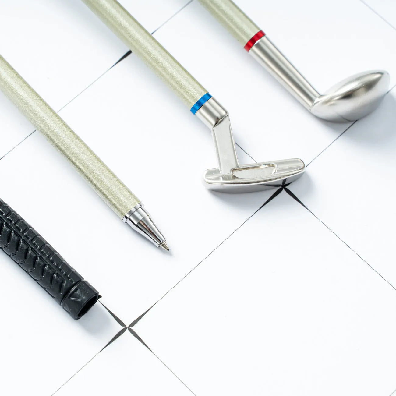 Three metal golf-themed ballpoint pens with 0.7mm bullet tips and normal suit colour refills