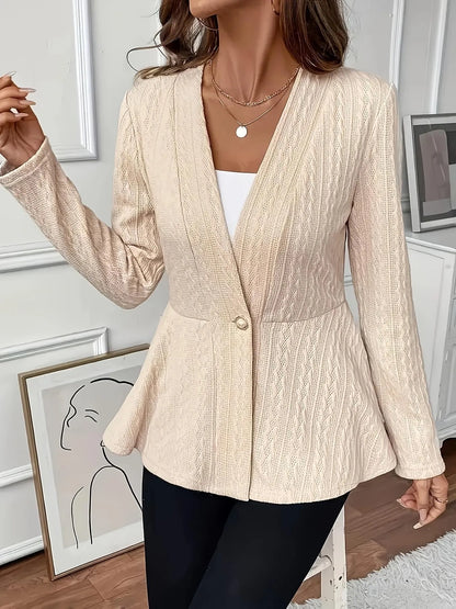 Women's apricot coloured knitted cardigan with jacquard pattern and one button front closure.