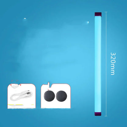 Blue rechargeable LED light tube with USB plug and push-button switch on a dark surface