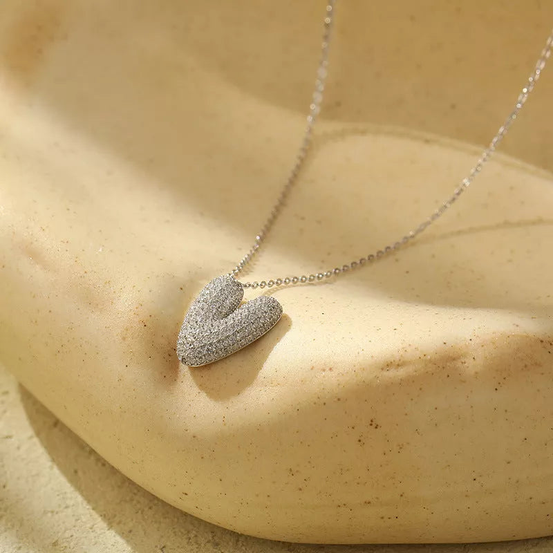 Stainless steel initial pendant necklace with zircon accents, personalized with your choice of letter.