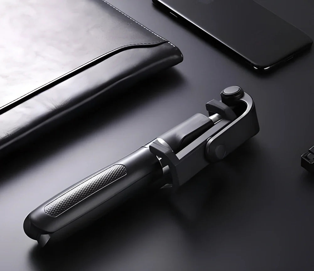 A 3-in-1 wireless Bluetooth selfie stick and tripod with a smartphone mounted on top, allowing for remote-controlled photography and video capture.