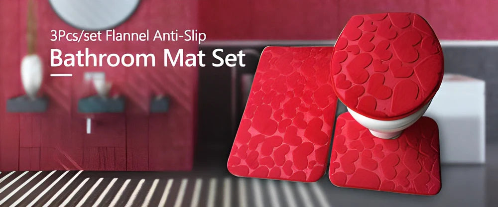 A 3-piece set of anti-slip bathroom mats in various decorative designs, including a rectangular bath mat, U-shaped toilet pad, and toilet lid cover.