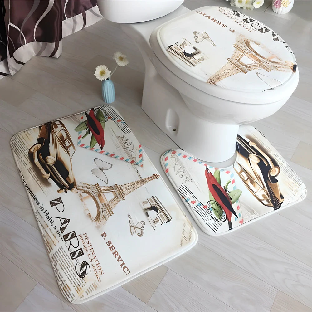 A 3-piece set of anti-slip bathroom mats in various decorative designs, including a rectangular bath mat, U-shaped toilet pad, and toilet lid cover.