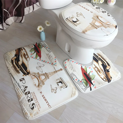 A 3-piece set of anti-slip bathroom mats in various decorative designs, including a rectangular bath mat, U-shaped toilet pad, and toilet lid cover.