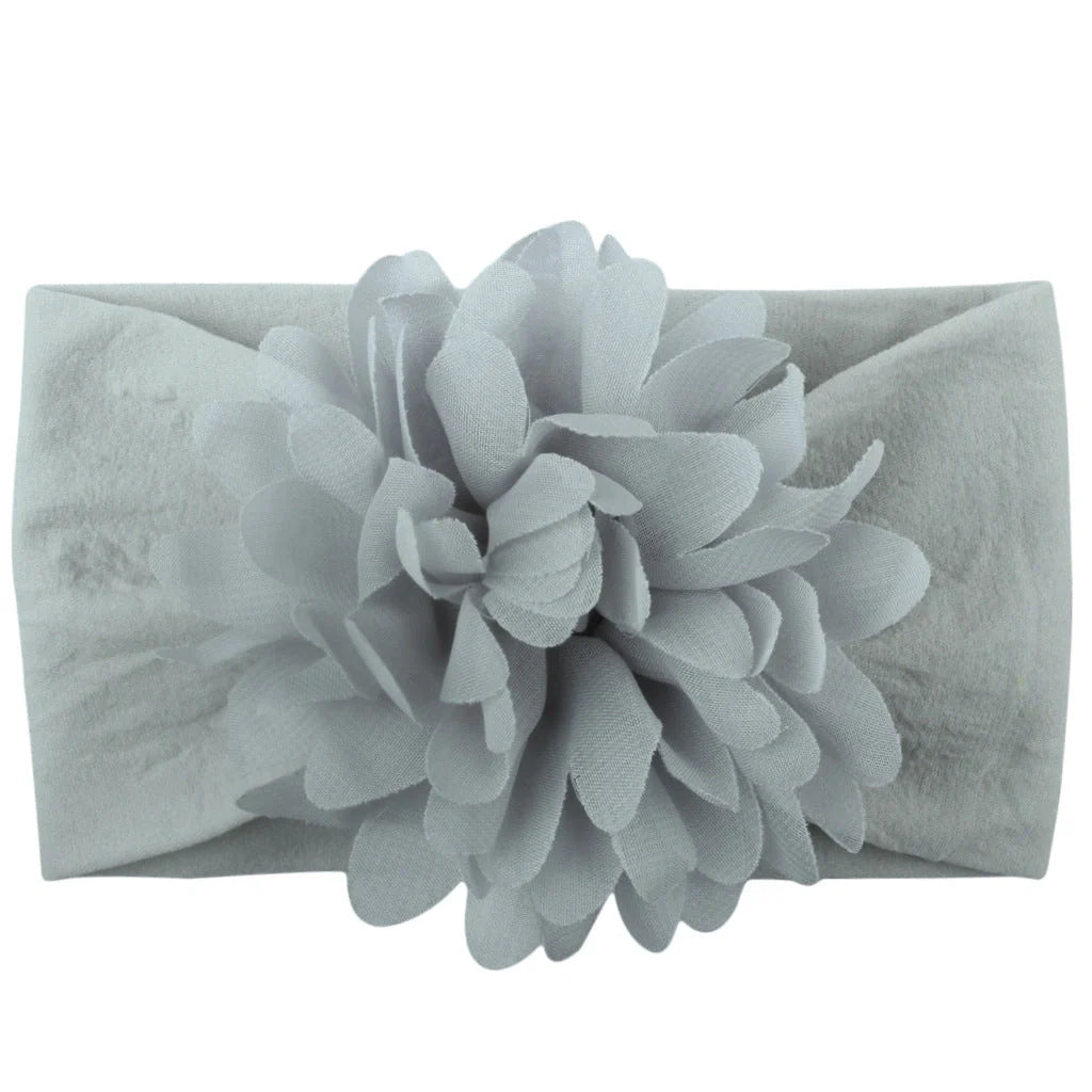Adorable chiffon flower baby headband for your little princess, available in multiple colors.