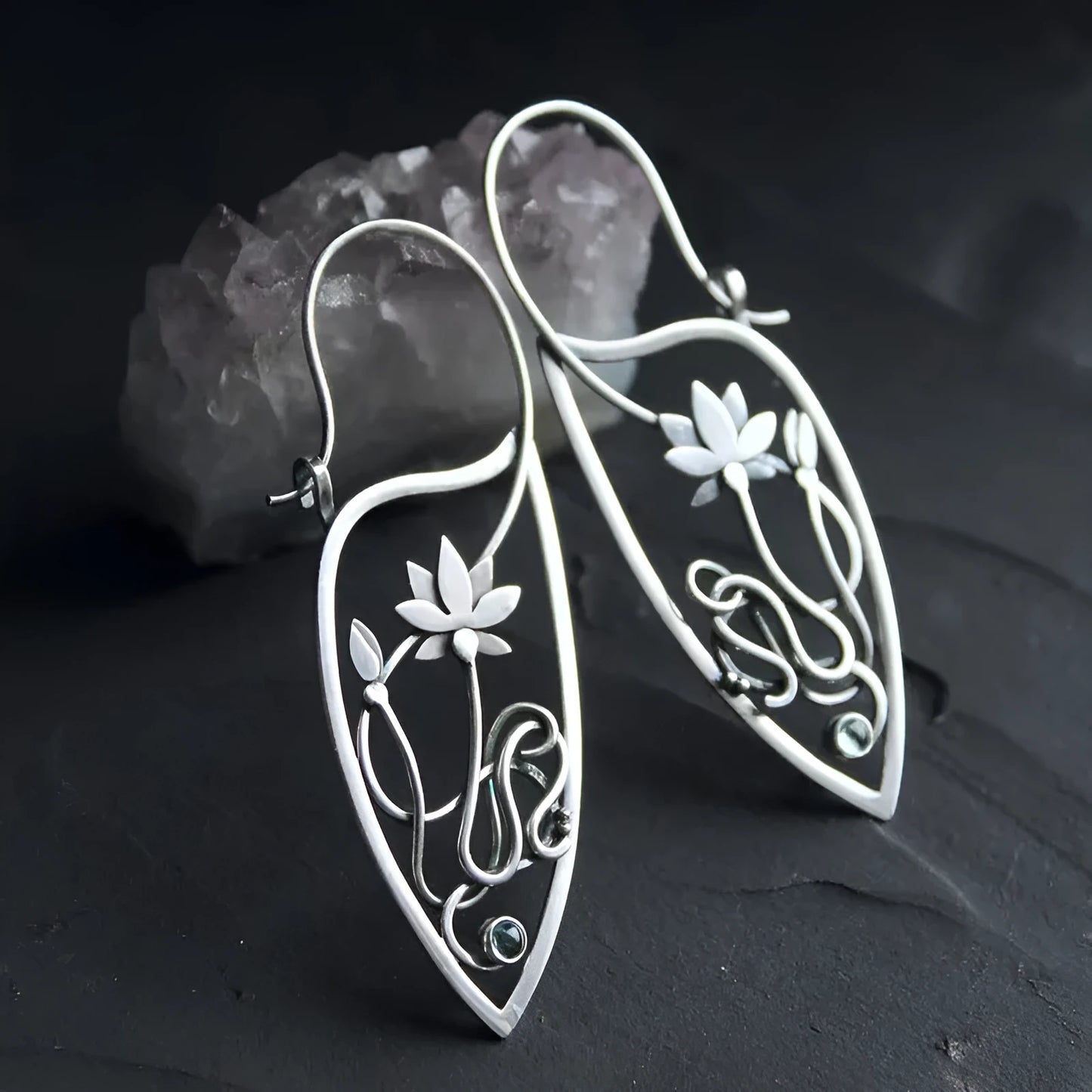 Silver electroplated alloy lotus vine earrings with geometric flower design and round rhinestone details