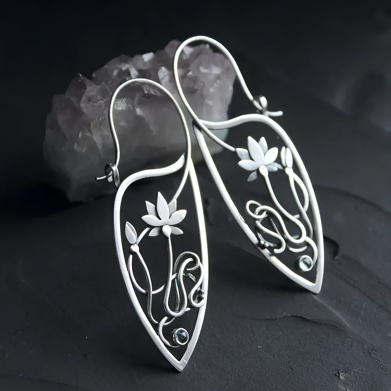 Silver electroplated alloy lotus vine earrings with geometric flower design and round rhinestone details