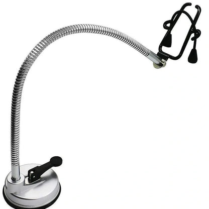 Stainless steel hair dryer holder with suction cup base showing 360-degree rotation capability