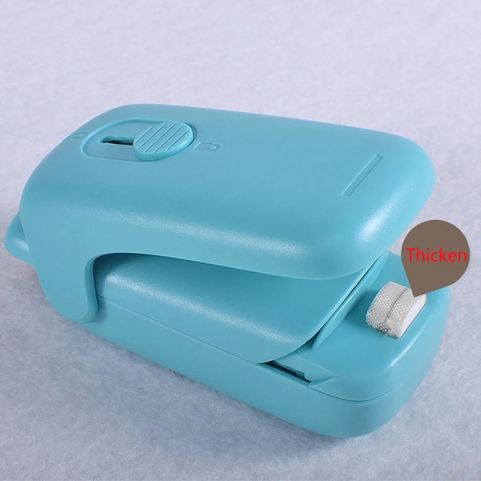 Mini hand pressure heat sealing machine measuring 10cm with magnetic base for plastic bag food preservation