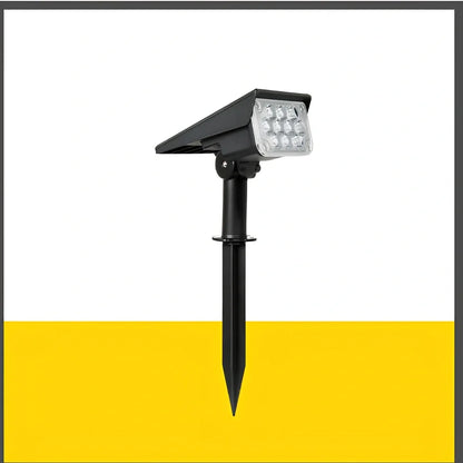 Adjustable solar garden light with black ABS/PC housing and directional spotlight head