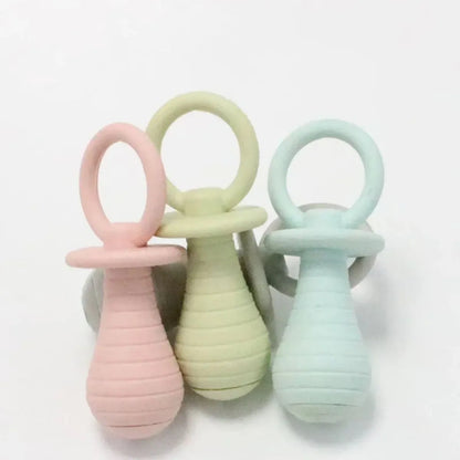 TPR rubber pet pacifier chew toys with squeaker in blue, gray, green and pink colours for dogs and cats