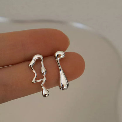 Asymmetric lava geometric silver earrings with round popular elements