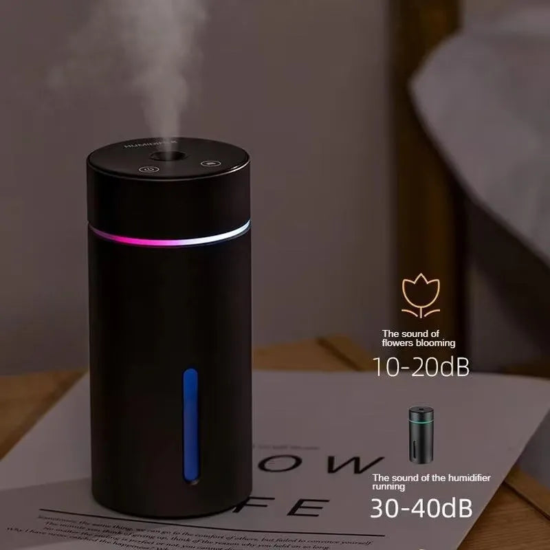 Black aluminium portable car humidifier and essential oil diffuser with night light on desk