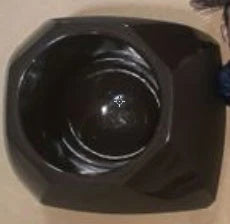 Comical Donald Trump-themed toilet brush made of durable plastic with a bold yellow color and convenient hanging slot