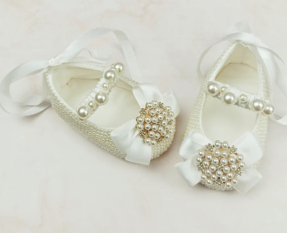 Handmade milky white cloth shoes with lace-up closure and matching fabric headband