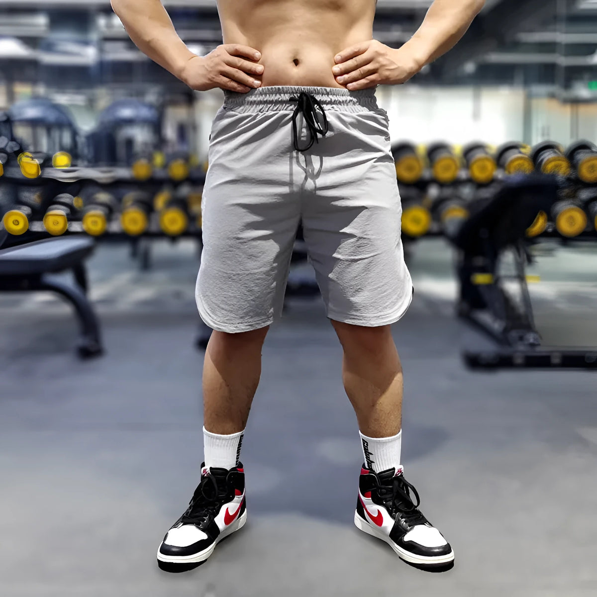 Men's thin quick-drying running shorts in black, blue, or grey, showing contrast colour detail.