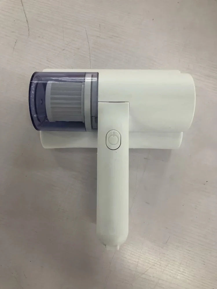 White wireless mite removal instrument with UV sterilisation for bedding cleaning