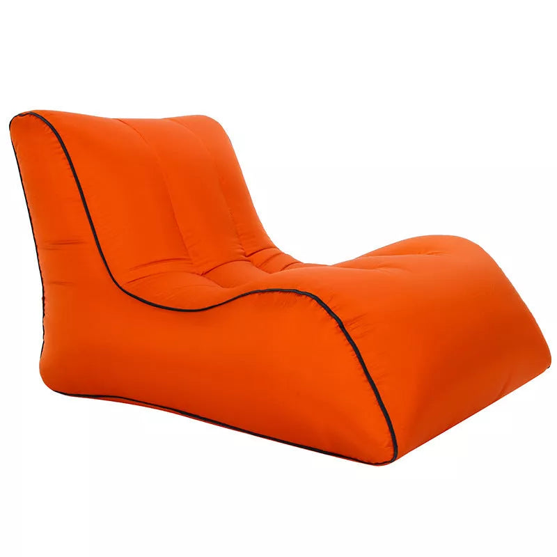Portable inflatable air sofa in various colors, perfect for outdoor use.