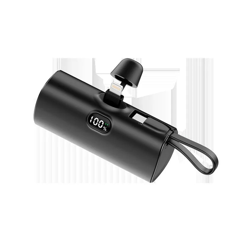 Capsule digital display wireless power bank showing battery percentage on screen, compact 79x34x26mm design with integrated plug